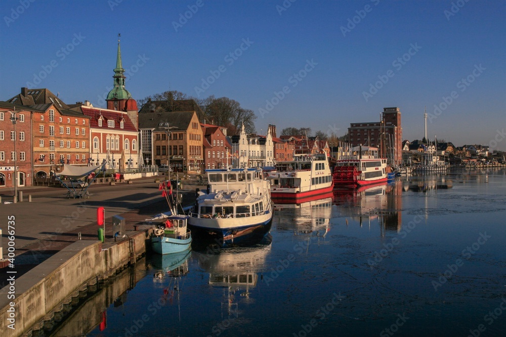 Scenic view to the picturesque skyline and colorful harbor of the town of Kappeln.