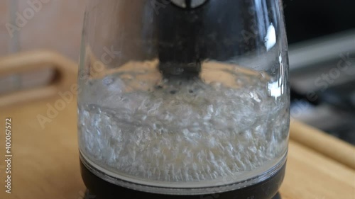 close-up of the process of boiling water in an electric kettle