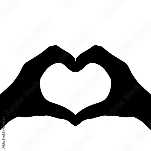 Silhouettes hands making heart symbol love