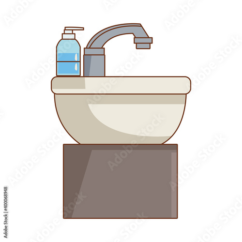 bathroom sink with antibacterial soap bottle