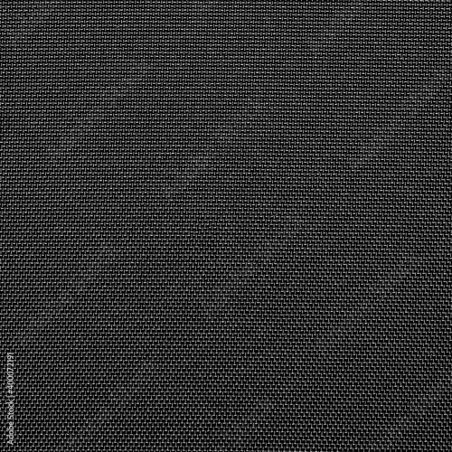 Synthetic black nylon fabric.Texture of dense black fabric.The background is nylon black.