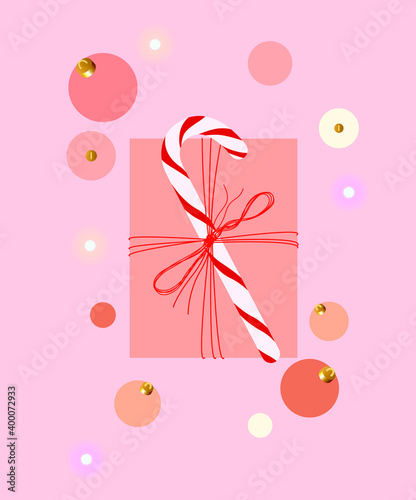 Delicate design with festive decorations.
Bright and modern illustration with realistic objects, gift box with bow knot and attached candy cane, Christmas tree decorations, bright lights.