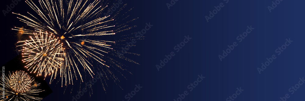 Blue Happy New Year background with golden fireworks