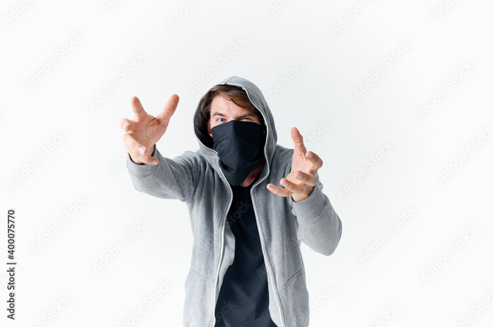 masked man in mask with hood emotions theft isolated background masked man in mask with hood emotions theft isolated background
