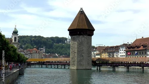 Iconic Chapel Bridge over the Reuss River in Luzern, Lucerne, Switzerland. photo