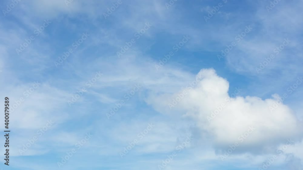 Beautiful timelapse white clouds fast fly in the azure sky. Beautiful timelapse white clouds fast fly in the azure sky.