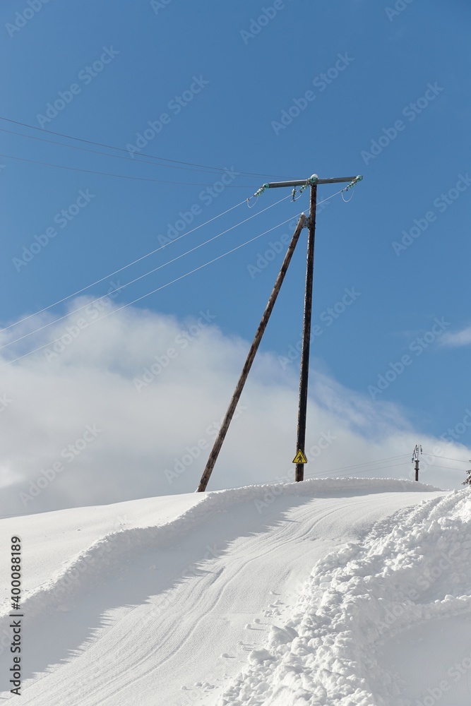 Mountain road in winter snowy village Mountain road in winter snowy village