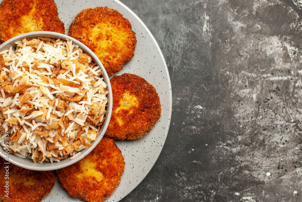 top close view fried cutlets with cooked rice on dark background food meat rissole top close view fried cutlets with cooked rice on dark background food meat rissole