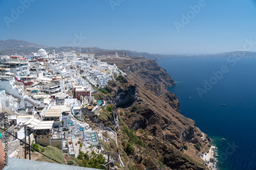 Balconies and roof tops in the village of Oia, Santorini. Architecture and landscape of Greece. Amazing panoramic view. © Marcin