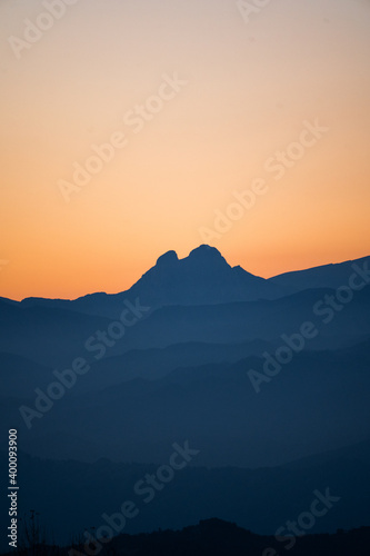 Mountain range at sunset or sunrise from the peak and of a magical mountain, vertical. Pedraforca, Bergueda, Barcelona, Catalonia, Spain. Serra del Cadí - Natural Park Cadí-Moixeró, Pyrenees-Pirineus. © Pol Solé