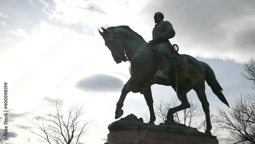 Robert E Lee statue in Market Square Park in Charlottesville, Virginia, confederate monument. Robert E Lee statue in Market Square Park in Charlottesville, Virginia, confederate monument.