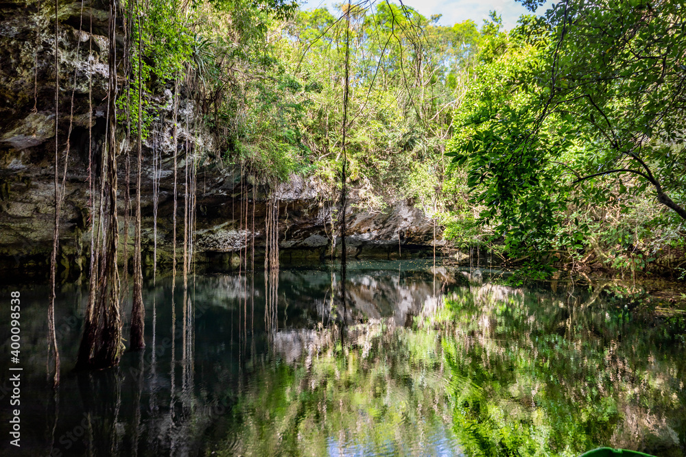 Scenic view of cenotes caves with fresh water in Mexico Scenic view of cenotes caves with fresh water in Mexico