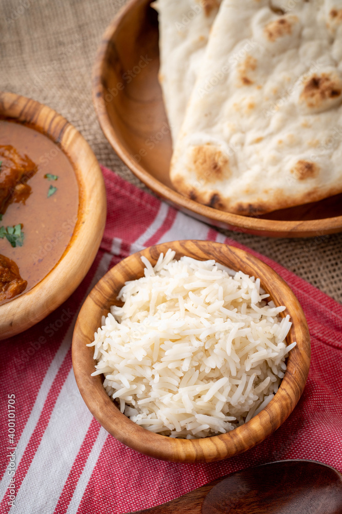 basmati rice in wooden bowl basmati rice in wooden bowl