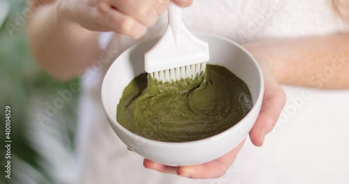 Young woman with henna hair dye, closeup