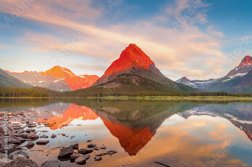 Sunset over Swiftcurrent Lake and Mount Grinnell in Many Glacier in Montana s Glacier National Park