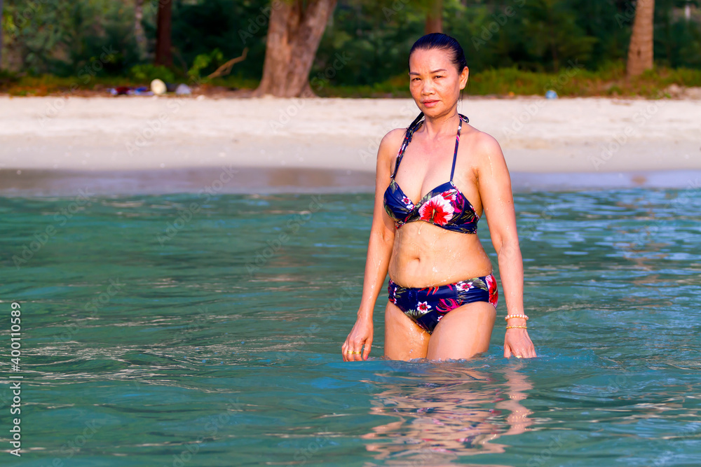 Woman in water with bikini beautiful Woman in water with bikini beautiful
