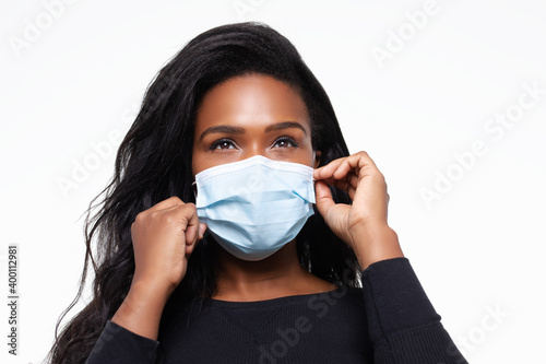 African-American woman wearing mask to keep her protect from viruses photo
