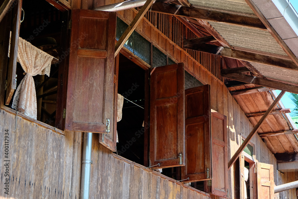 Detail of Old wooden window ,Thailand traditional style house Detail of Old wooden window ,Thailand traditional style house