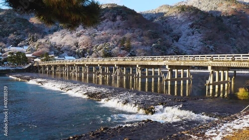 雪化粧をした京都　嵐山　渡月橋の冬 photo