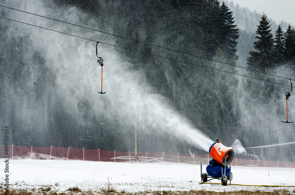 Fototapeta premium Working Snow canon on the mountain started to create snow