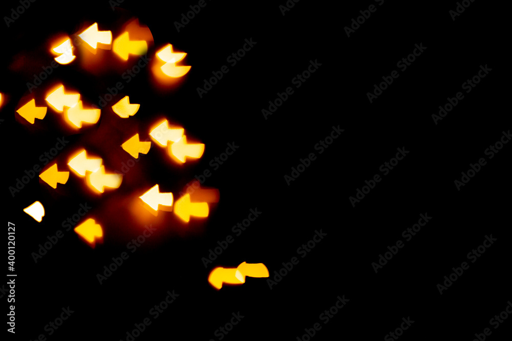 Naklejka premium bokeh of colorful bright arrows on a dark background