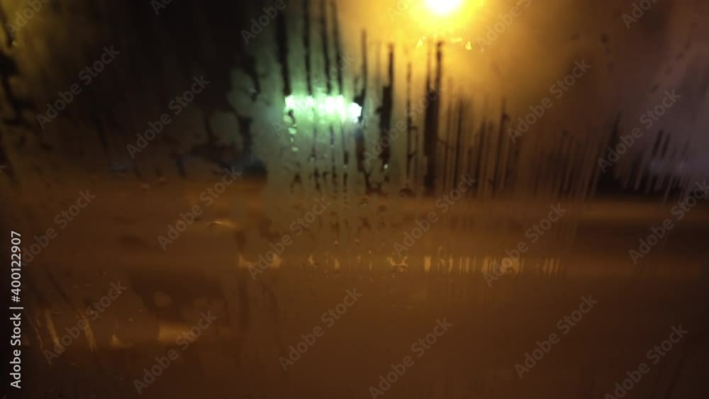 car drive at night with rain, wide window view car drive at night with rain, wide window view