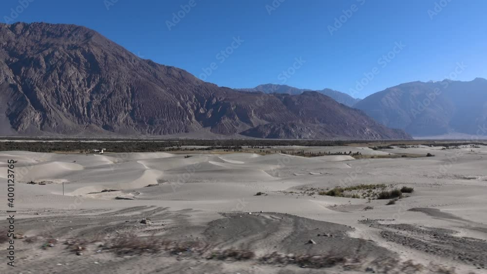 Moving scenery seen through the windows of a vehicle at Leh Ladakh, Jammu and Kashmir, India Moving scenery seen through the windows of a vehicle at Leh Ladakh, Jammu and Kashmir, India