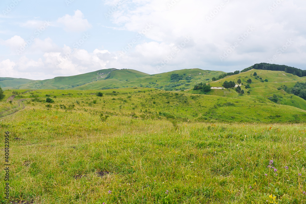 Marvellous landscape with meadows and forests in foothills of North Caucasus.