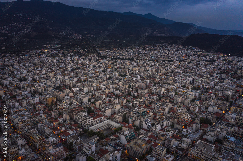 Obraz premium Aerial panoramic view of Volos city at twilight. Magnesia - Greece.