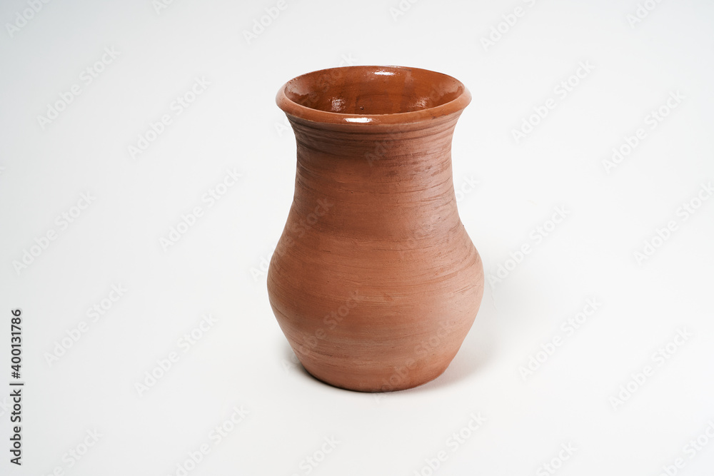 Pottery Craft, ceramic product with your own hands, made on a Potter's wheel, isolated on a white background