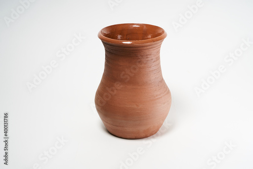 Pottery Craft, ceramic product with your own hands, made on a Potter's wheel, isolated on a white background