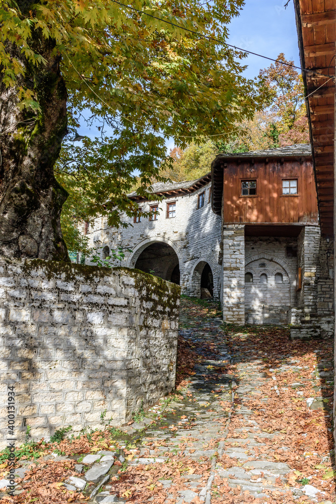 The picturesque village of Koukouli during fall season with its architectural traditional old stone  buildings located on Tymfi mount, Zagori, Epirus, Greece, Europe