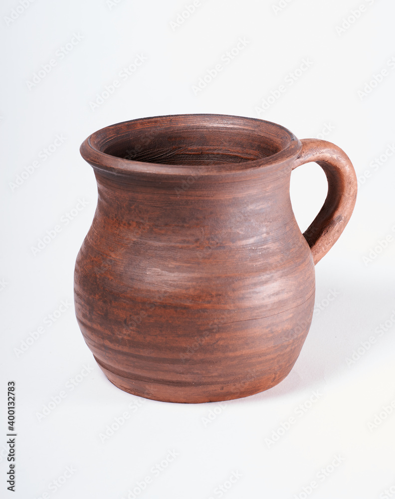 Pottery Craft, ceramic product with your own hands, made on a Potter's wheel, isolated on a white background