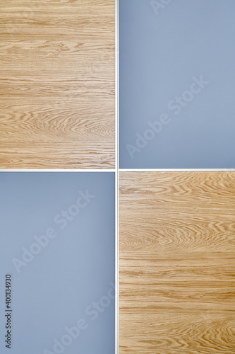 Wooden wardrobe door panels made of light brown natural oak timber with elegant texture patterns and blank grey parts