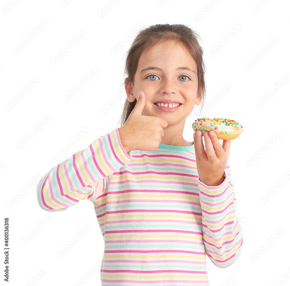 Cute little girl with sweet donut showing thumb-up on color background Cute little girl with sweet donut showing thumb-up on color background