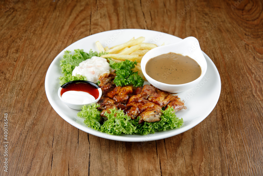 a plate of chicken grill set come with french fries and coleslaw a plate of chicken grill set come with french fries and coleslaw