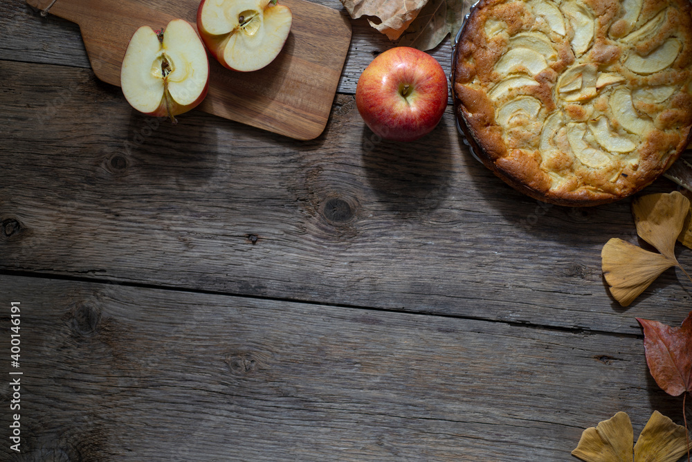 Traditional homemade apple pie on wooden table. Copy spce. Top view.
Traditional homemade apple pie on wooden table. Copy spce. Top view.