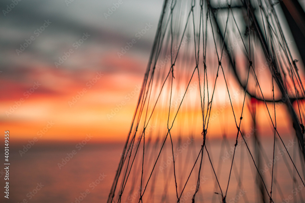 Fototapeta premium sunset in the sky fishing net