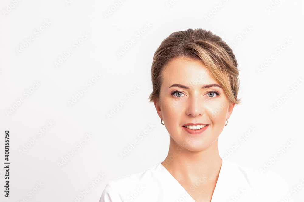 Portrait of a happy smiling professional beautician on white background with empty space for text Portrait of a happy smiling professional beautician on white background with empty space for text