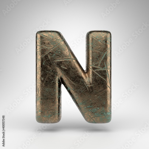 Letter N uppercase on white background. Bronze 3D letter with oxidized scratched texture.