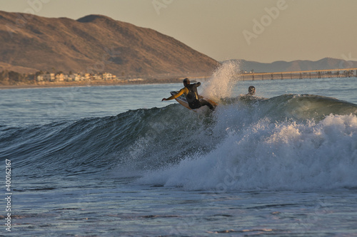 Photography surfing at sunset at Rincon point in California