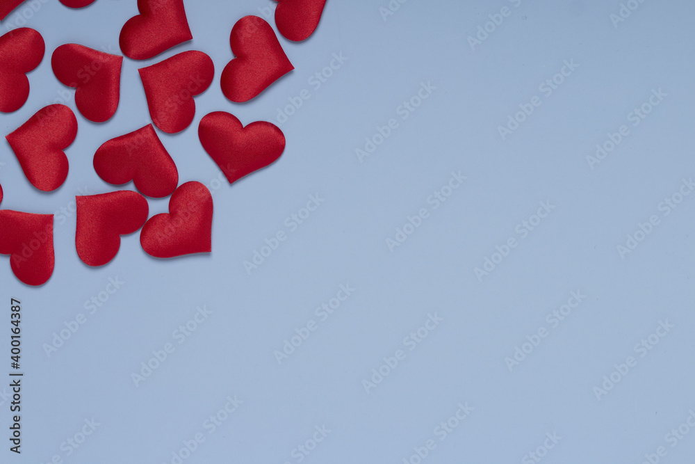 Red hearts on blue background top view. Valentine day greeting card . Copy Space Red hearts on blue background top view. Valentine day greeting card . Copy Space