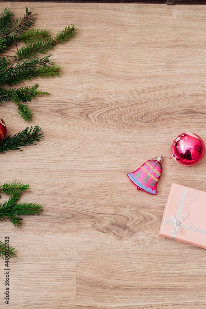 Christmas Tree Branches and on a Wooden Background with Copy Space Christmas Tree Branches and on a Wooden Background with Copy Space