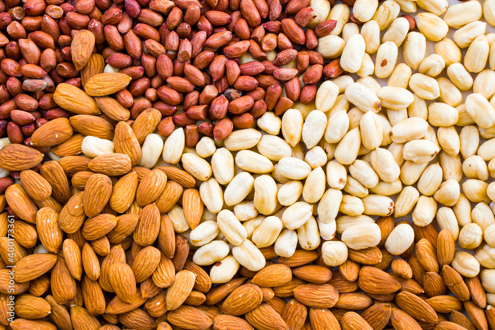 Almonds, peanut and hazelnuts in the bowl, beer and healthy snack Almonds, peanut and hazelnuts in the bowl, beer and healthy snack
