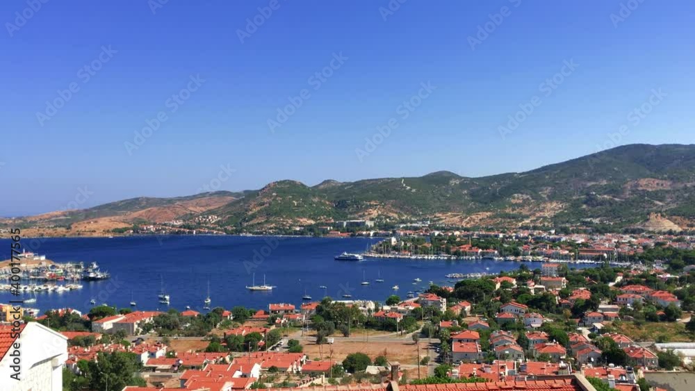 Aerial view of a fisher town called Foca and time lapse of seabus or public transportation leaving the town. Aerial view of a fisher town called Foca and time lapse of seabus or public transportation leaving the town.