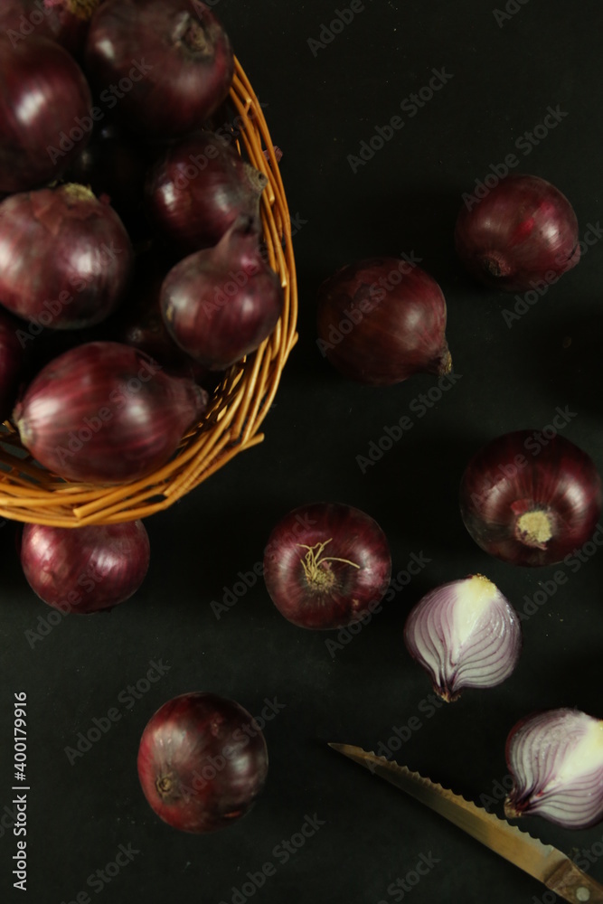 Obraz premium sweet red onions on background