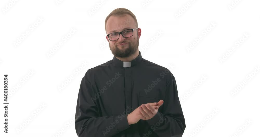 Disappointed Caucasian priest clapping hands with ironic look. Human emotions concept. Isolated on white background Disappointed Caucasian priest clapping hands with ironic look. Human emotions concept. Isolated on white background