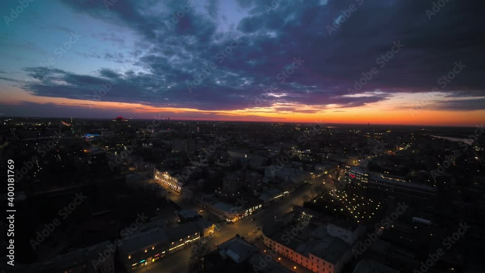 Flying over a provincial town at sunset Flying over a provincial town at sunset