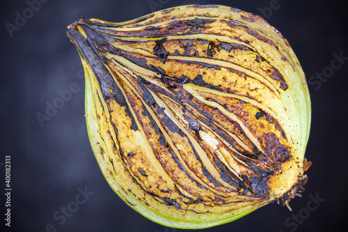 Closeup on charred onion with black background