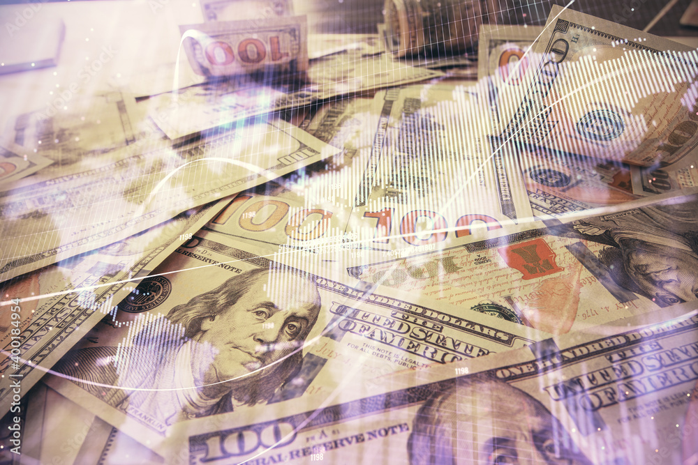 Multi exposure of forex chart drawing over us dollars bill background. Concept of financial success markets. Multi exposure of forex chart drawing over us dollars bill background. Concept of financial success markets.